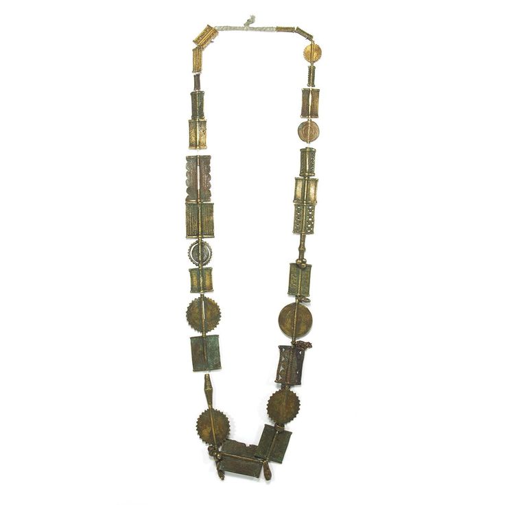 Brass Heirloom Necklace From The Baoule people of Côte d'Ivoire ca. 1900 #2 Goldsmith of the Akan Speaking People who fashioned exquisite figurative bronze weights for measuring gold and gold dust, also created similar style bronze beads to not only resemble the weights in style, but also the fine gold jewelry worn by Noble Men and Women in their communities. Although not made from gold, these bronze versions were highly prized and valued, and were passed down as Heirloom Beads through generatio Heirloom Necklace, Fine Gold Jewelry, Gold Dust, Figurative, In Style, Gold Jewelry, Brass, Personalized Items, Beads