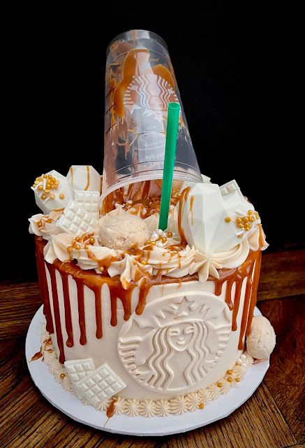 a starbucks iced cake with caramel drizzle and whipped cream on the top