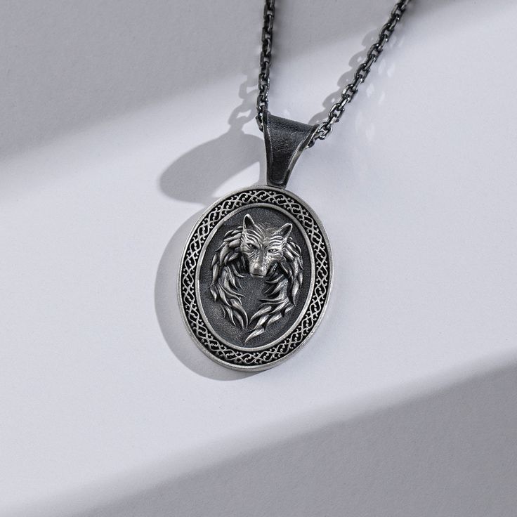 Silver Wolf engraving pendant. The most intricate, personal and meaningful handcrafted pendant you can ever find! We custom personalize each pendant with words, names or date of your choice. The possibilities are endless! Add a touch of sophisticated flair to any outfit. Guaranteed to be a great conversation starter. This pendant is perfect for anyone who loves wolves, or just simply appreciates nature. The sterling silver charm necklace will be his new favourite accessory as it goes with all hi Engraved Sterling Silver Friendship Necklace, Engraved Sterling Silver Necklace For Friendship, Sterling Silver Engraved Necklace For Friendship, Handmade Dog Tag Necklace For Gift, Engraved Pendant Necklaces For Friendship, Engraved Pendant Necklace For Friendship, Engraved Round Pendant Jewelry For Friendship, Friendship Engraved Round Pendant Jewelry, Silver Round Pendant Necklace For Friendship