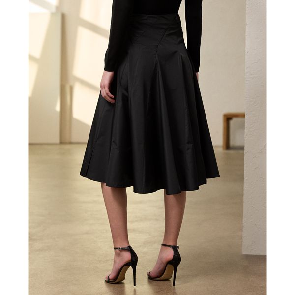 Crafted in Italy with crisp featherweight taffeta for a sculpted character and lightweight feel the Emily elevates the traditional circle skirt with engineered bias seams and godets which release beautifully at the hip then extend outwards towards the hem to create a full drape. Elegant A-line Gathered Skirt, Full Evening Skirt With Folds, Evening Full Skirt With Folds, Fitted Taffeta Full Skirt, Elegant Evening Skirt With Flared Hem, Formal Full Skirt With Folds, Chic Evening Skirt With Flared Hem, Fitted Silk Skirt With Folds, Elegant Asymmetrical Skirt With Folds