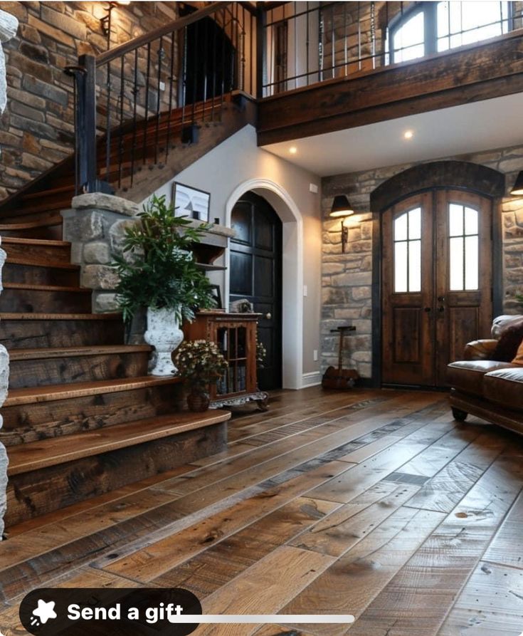 a living room with wood floors and stone walls on the wall is pictured in this image