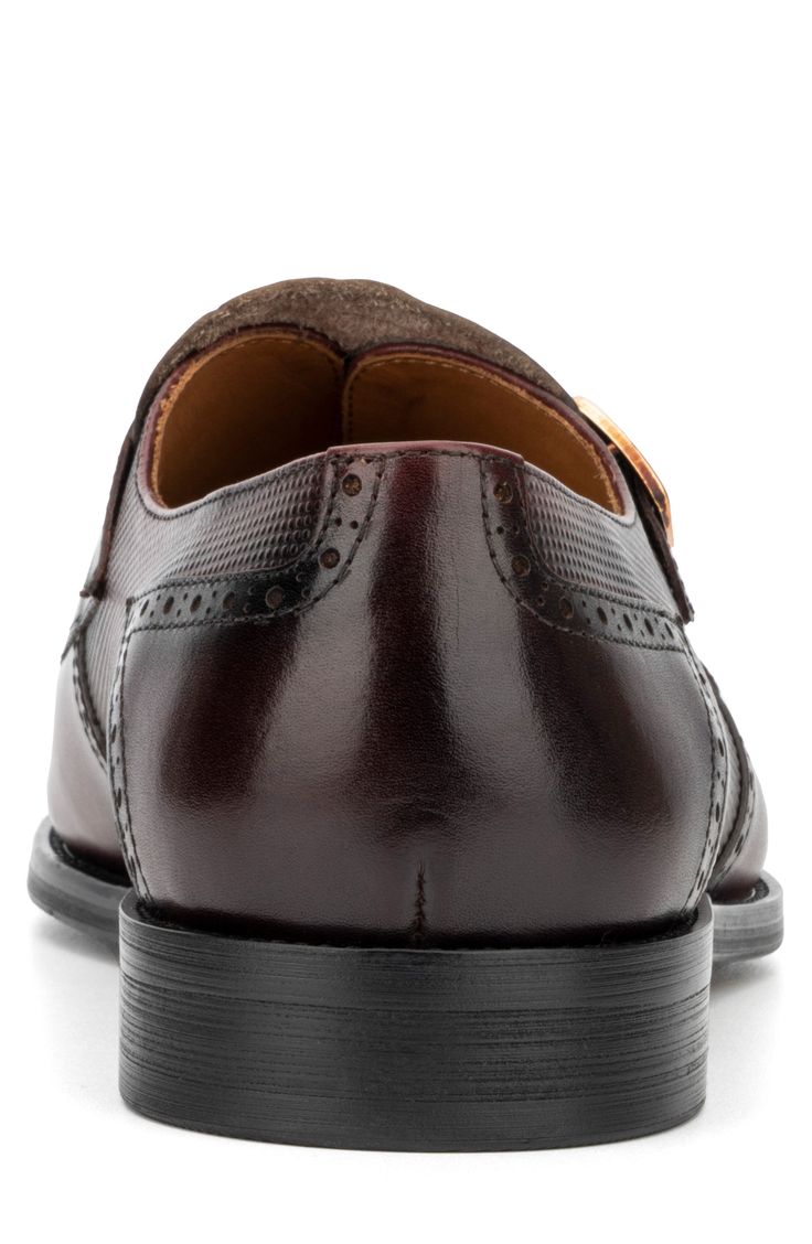 This texture-rich leather loafer boasts an ornate design with brogue detail and a kiltie vamp. The double-buckle monk straps provide a secure fit for added comfort. Double monk strap vamp Cushioned insole Leather upper and lining, rubber sole Imported Masculine Brown Wingtip Monk Strap Shoes, Brown Wingtip Monk Strap Shoes With Leather Lining, Brown Monk Strap Wingtip Shoes With Leather Lining, Brown Wingtip Monk Strap Shoes For Office, Brown Cap Toe Monk Strap Shoes For Derby, Brown Monk Strap Shoes With Brogue Detailing, Vintage Brown Monk Strap Shoes For Formal, Brown Wingtip Monk Strap Shoes For Derby, Vintage Monk Strap Shoes With Round Toe For Business