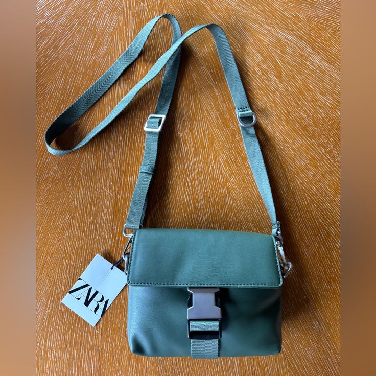 Zara Crossbody Bag. Brand New. Olive Green Zara Shoulder Bag With Adjustable Strap, Zara Crossbody Shoulder Bag For Travel, Zara Shoulder Bag With Removable Pouch For Travel, Green Everyday Bag With Magnetic Closure, Zara Crossbody Shoulder Bag For Daily Use, Zara Rectangular Shoulder Bag With Zipper Closure, Green Bag With Magnetic Closure For Everyday Use, Trendy Zara Pouch Shoulder Bag, Zara Bag For Everyday Use