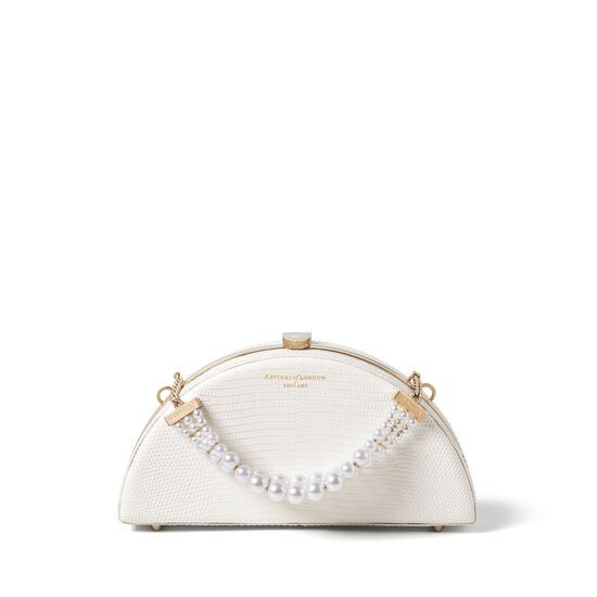 Elegant Shoulder Bag With Gold-tone Hardware, Elegant Pouch Shoulder Bag With Gold-tone Hardware, Luxury Event Clutch With Top Handle, Elegant White Evening Bag, Elegant Pearl Clutch With Pearl Handle, Elegant Clutch With Gold-tone Hardware, Luxury Pearl Clutch For Formal Occasions, Chic Pearl Clutch For Formal Occasions, Chic Pearl-embellished Clutch For Formal Occasions