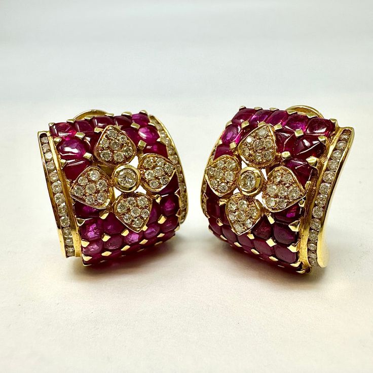 18K Gold Diamond and Ruby Square Clip-on Earrings (includes appraisal, Value: $12,000) Designer = Jewelry Material = 18K Gold Gemstone = Diamond/Ruby Condition = Excellent Class = Premier Location: Wilmette Item Number: 3243-116 Item ID: 270171 Category: Earrings Luxury Multi-stone Diamond Earrings For Formal Occasions, Luxury Multi-stone Earrings For Formal Occasions, Luxury Multi-stone Diamond Earrings, Luxury Multi-stone Diamond Earrings For Anniversary, Luxury Hand Set Yellow Gold Earrings, Luxury Diamond Gemstone Earrings For Party, Luxury Diamond Gemstone Earrings For Formal Occasions, Luxury Diamond Earrings With Gemstones For Formal Occasions, Luxury Clip-on Earrings With Diamond Accents For Formal Occasions