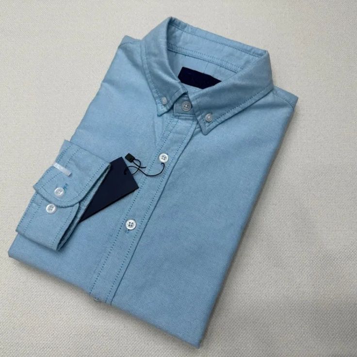 This Oxford business casual long sleeve cotton shirt is perfect for any business setting. Made of high-quality cotton, it offers comfort and style all day long. This shirt is a must-have for any professional wardrobe. Benefits: Comfort & perfect fitting Gender: Men Season: All season Material: Cotton 100% Please check the size chart carefully before placing the order FOR MORE INFORMATION PLEASE CONTACT: antonioclothingstore@gmail.com FREE SHIPPING WORLDWIDE ON ALL ORDERS 14 DAYS RETURN AND FULL Elegant Pant, Monk Strap Shoes, Professional Wardrobe, Cotton Shirts For Men, Fabric Shoes, Brogue Shoes, Cotton Long Sleeve Shirt, Elegant Shoes, Penny Loafers