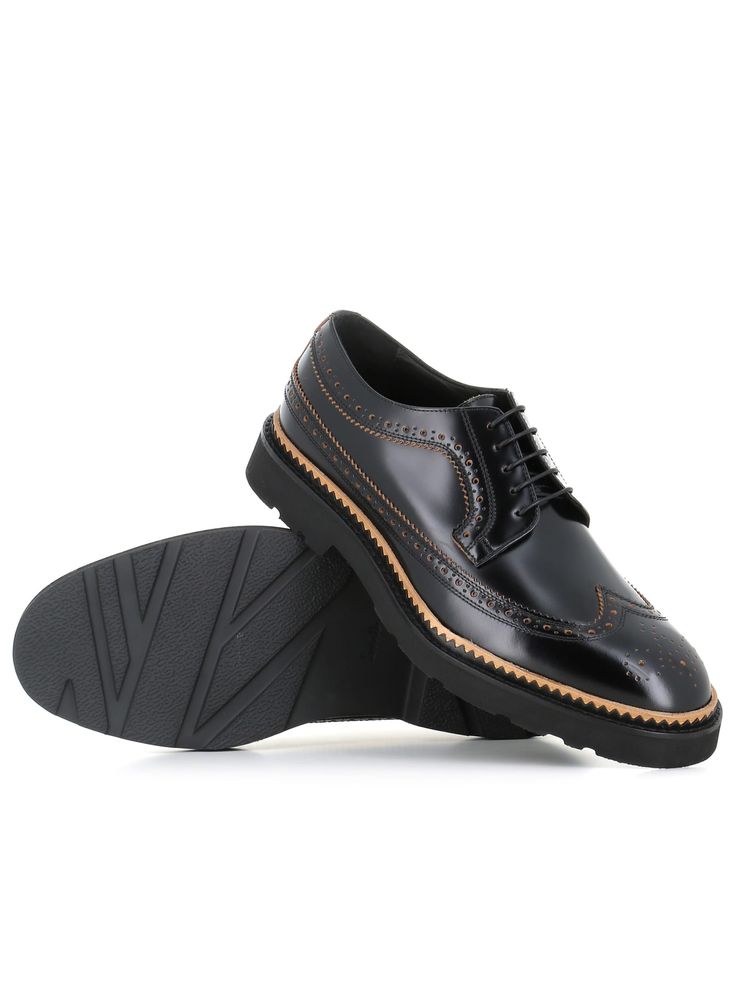 Black brushed leather men's brogues by Paul Smith. Leather fund wiht higt rubber sole. Lined interior. Heel: 3 cmComposition: Leather Black Wingtip Calf Leather Oxfords, Designer Wingtip Leather Shoes With Brogue Detailing, Calf Leather Wingtip Derby With Rubber Sole, Designer Black Oxfords With Brogue Detailing, Masculine Leather Shoes With Brogue Detailing, Wingtip Patent Leather Dress Shoes With Textured Sole, Designer Wingtip Dress Shoes With Rubber Sole, Luxury Black Derby Shoes With Brogue Detailing, Luxury Black Derby Shoes With Rubber Sole