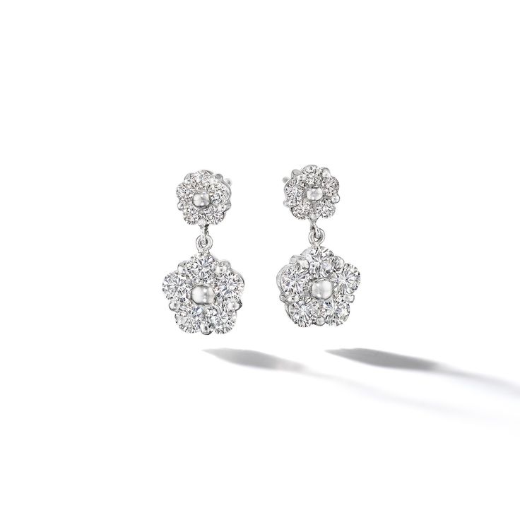 Handcrafted pair of platinum diamond drop earrings featuring ten round brilliant cut diamonds set in Anzia Collection's floral motif. Luxury Flower Shaped Diamond Earrings, Formal Flower-shaped Diamond Earrings With Accents, Formal Flower Shaped Diamond Earrings With Accents, Diamond White Flower-shaped Diamond Earrings, Dazzling Flower-shaped Diamond Earrings For Formal Occasions, Dazzling Flower Shaped Diamond Earrings For Formal Occasions, Dazzling Diamond Flower Shaped Earrings For Formal Occasions, Luxury White Gold Flower Earrings For Formal Occasions, Formal Cubic Zirconia Diamond Earrings With Flower Shape