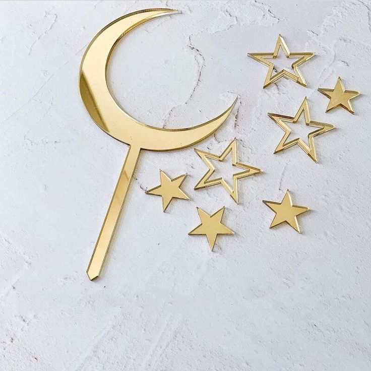 gold stars and crescent on white background