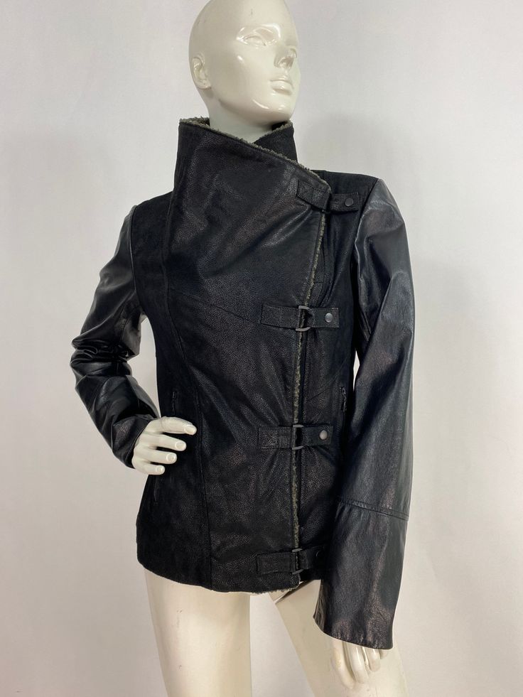 "Genuine leather jacket, warm leather jacket, size small  Measurements:  Shoulder 17\"-18\"/sleeve 25\"/bust (pit-pit)19\"/waist 17\"/bottom width 19\"/length 23\" Mannequin measurements:  5'8\", bust 34\", waist 25\", hip 33\" Please note that vintage clothing sizes can vary greatly.  The Measurements provided  are approximate and are taken lying flat.  I suggest taking a similar garment from your wardrobe and measure it while lying flat.  This way you can compare measurements.  All of our piec Fitted Leather Jacket For Cold Weather, Winter Faux Leather Jacket For Cold Weather, Winter Soft Leather Outerwear, Fitted Faux Leather Winter Outerwear, Fitted Faux Leather Outerwear For Winter, Fitted Biker Jacket With Padded Collar For Fall, Fitted Fall Biker Jacket With Padded Collar, Fitted Leather Jacket For Fall And Cold Weather, Fitted Leather Jacket For Cold Weather In Fall