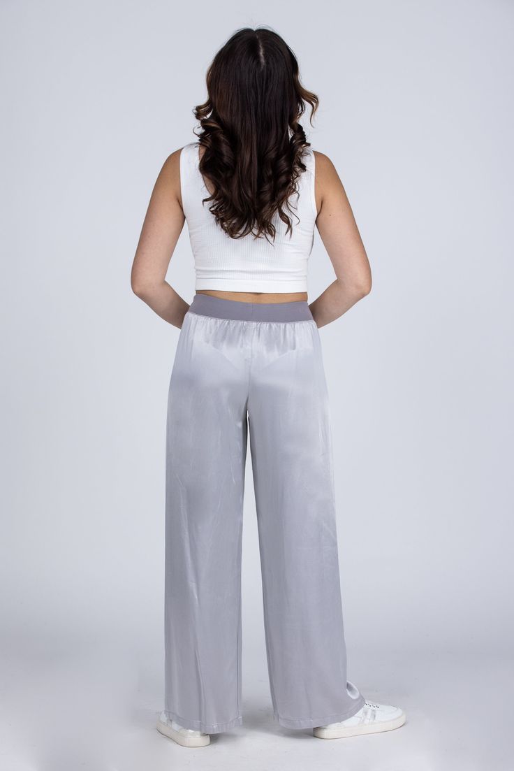 Lounging In Satin Lounge Pants by PJ Harlow will have you feeling elegant day or night! These luxe satin pants feature a wide leg and ribbed waist with adjustable tie. You will feel fancy as you are lounging and sleeping at home! Made in the USA Women owned business Fabric: 75% Rayon 25% Satin Faille Contrast Measurements: Rise (Size M): 31" Inseam (Size M): 12" True To Size S 0-6 M 6-10 L 10-14 XL/1XL 14-18 Women Owned Business, Usa Women, Satin Pants, Lounge Pants, Wide Leg, At Home, How Are You Feeling, Lounge, Satin