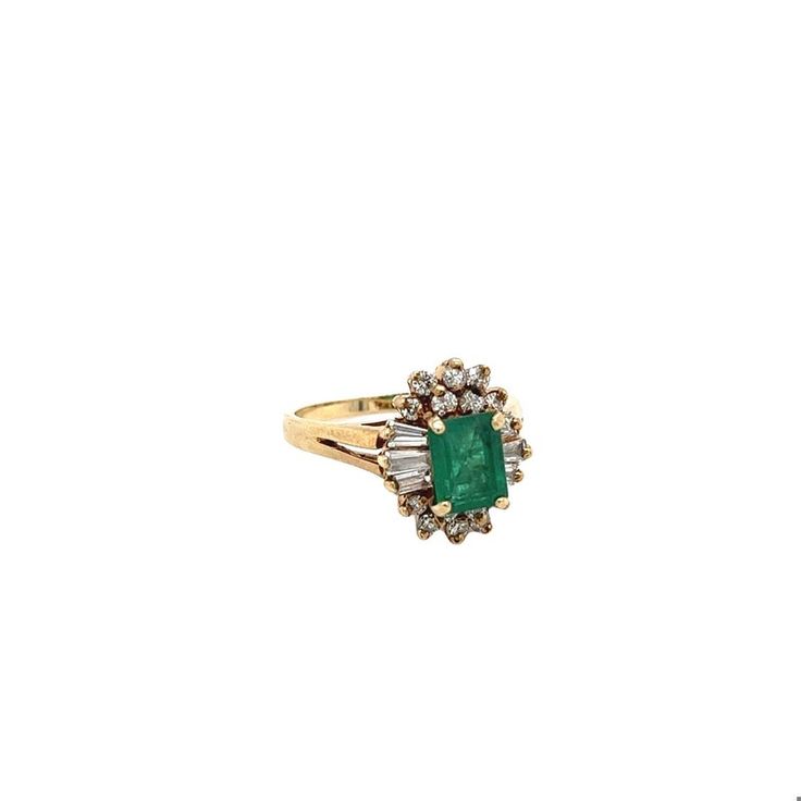 Ring Details: ✔ Gold Karat: 14K ✔ Ring Size: 7 ✔ Ring Weight: 3.9 grams ✔ Mounting: Prong ✔ Shank: Cathedral ✔ Diamonds: (6 baguette-cut diamonds, 0.24ctw) (14 round cut diamonds, 0.19ctw)  Emerald Details: ✔ Carat: 1.00 ✔ Cut: Emerald ✔ Origin: Colombia ✔ Color: Green (deep) ✔ Clarity: Very good ✔ Luster: Excellent Vintage natural Emerald and natural diamond ring in 14k solid yellow gold. This vibrant Emerald bears excellent color and luster. It's well contrasted by a round and baguette-cut dia Yellow Gold Cluster Emerald Ring Fine Jewelry, Cluster Emerald Ring In Yellow Gold With 17 Jewels, Emerald Ring In 14k Yellow Gold With Baguette Diamonds, Classic Multi-stone Baguette Cut Diamond Ring, Emerald Ring With Baguette Diamonds In 14k Yellow Gold, Formal Yellow Gold Cluster Ring With Baguette Diamonds, Gold Cluster Rings With Baguette Diamonds, Oval Gold Rings With Baguette Diamonds, Oval Yellow Gold Ring With Baguette Diamonds