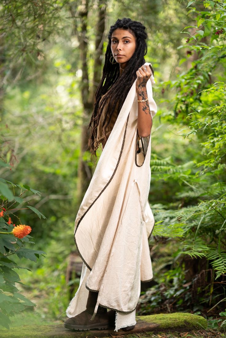 This Bedouin Kimono is an absolutely stunning piece! Inspired by the nomadic people. Our stunning Kimono is perfect for those who appreciate the versatility and bohemian style. Made from cotton and handwoven fabric. This kimono is very light and comfortable-to-wear hooded. It features unique detailed linings at the back and on the edges throughout the design, it also comes with a belt, ensuring comfort and chicness at the same time. MEASUREMENTSLength: 154 cm / 60.6"Waist Width 154 cm / 60.6" - Bohemian Beige Kimono For Festival, Bohemian Cotton Tunic Kimono, Hippie Wrap Kaftan For Festivals, Bohemian Beige Kaftan For Festival, Bohemian Cotton Kimono For Festival, Cotton Bohemian Kimono For Festival, Bohemian Handwoven Poncho For Festival, Cotton Festival Tunic Kimono, Traditional Cotton Poncho For Festival