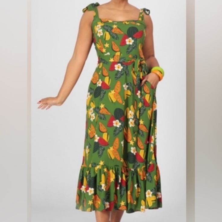 Bow Tie Strap Fruit Dress. Back Zipper, Waist Tie Belt. Very Lightweight And Summery. New Without Tags Eur Size 12=Us 8 Tropical Print Sundress For Garden Party, Casual Tropical Print Sundress For Garden Party, Green Tropical Print Midi Dress For Garden Party, Sleeveless Tropical Print Midi Dress For Garden Party, Tropical Midi Dress With Tropical Print For Day Out, Tropical Sleeveless Midi Dress For Garden Party, Green Tropical Midi Dress For Summer, Green Tropical Print Midi Dress For Vacation, Green Tropical Print Summer Midi Dress