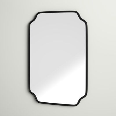 Bring a dynamic look to your bathroom or hallway with this wall-hanging mirror. Crafted with an engineered wood frame, its design features clean, curved lines and a rectangular silhouette, complete with notched corners for a subtle art deco look. We love that its solid hue finish shows off a glossy look that pairs well with any decor aesthetic or color scheme. Plus, the mirrored surface shows off beveled edges, adding a traditional element. Best of all, it comes with hanging hardware that lets y Rectangle Wall Mirror, Glossier Look, Hanging Wall Mirror, Curved Lines, Decor Aesthetic, Hanging Mirror, Beveled Edge, White Wood, Wall Mirror