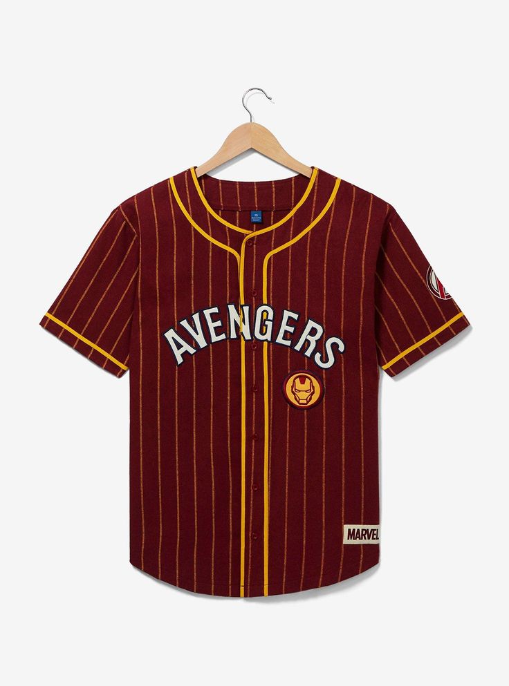 Add some Iron Man fashion to your gameday attire with this Marvel-inspired baseball jersey! With a pinstriped design  the front of this shirt includes embroidered "Avengers" lettering and an Iron Man helmet patch with an Avengers logo patch on one sleeve. The back of the jersey features "Stark" and "63" lettering to commemorate the year the hero was first introduced.A BoxLunch Exclusive!Sustainable cotton flannelListed in unisex sizesWash cold with like colors; dry lowImported Iron Man Helmet, Avengers Logo, Marvel Iron Man, Man Fashion, Baseball Jersey, Baseball Jerseys, Cotton Flannel, Vintage Tshirts, Iron Man