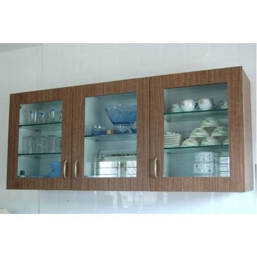 two wooden cabinets with glass doors and dishes on the top shelf in front of them