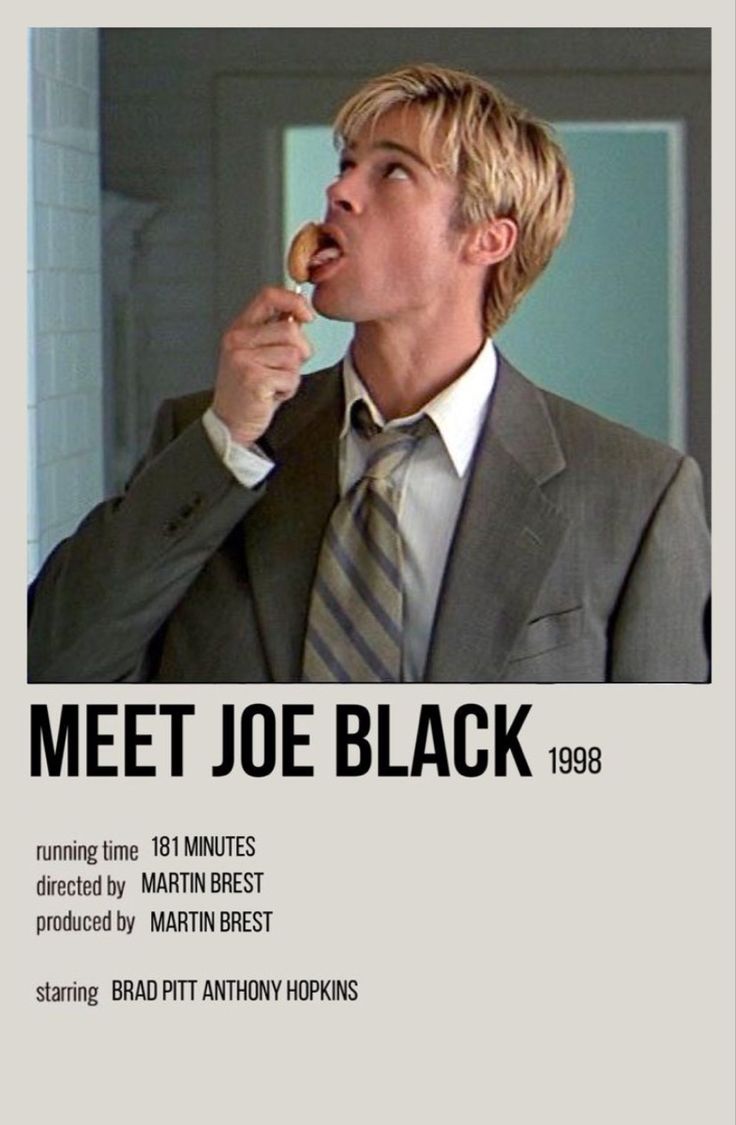 a man in a suit eating something with his mouth open and the caption meet joe black 1989