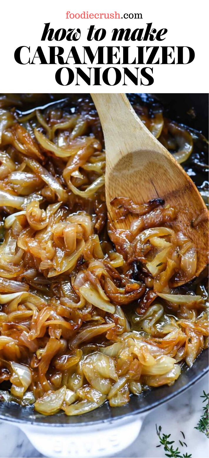 an image of caramelized onions cooking in a skillet with a wooden spoon