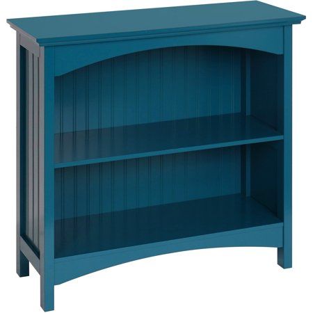 a blue book shelf with two shelves on each side