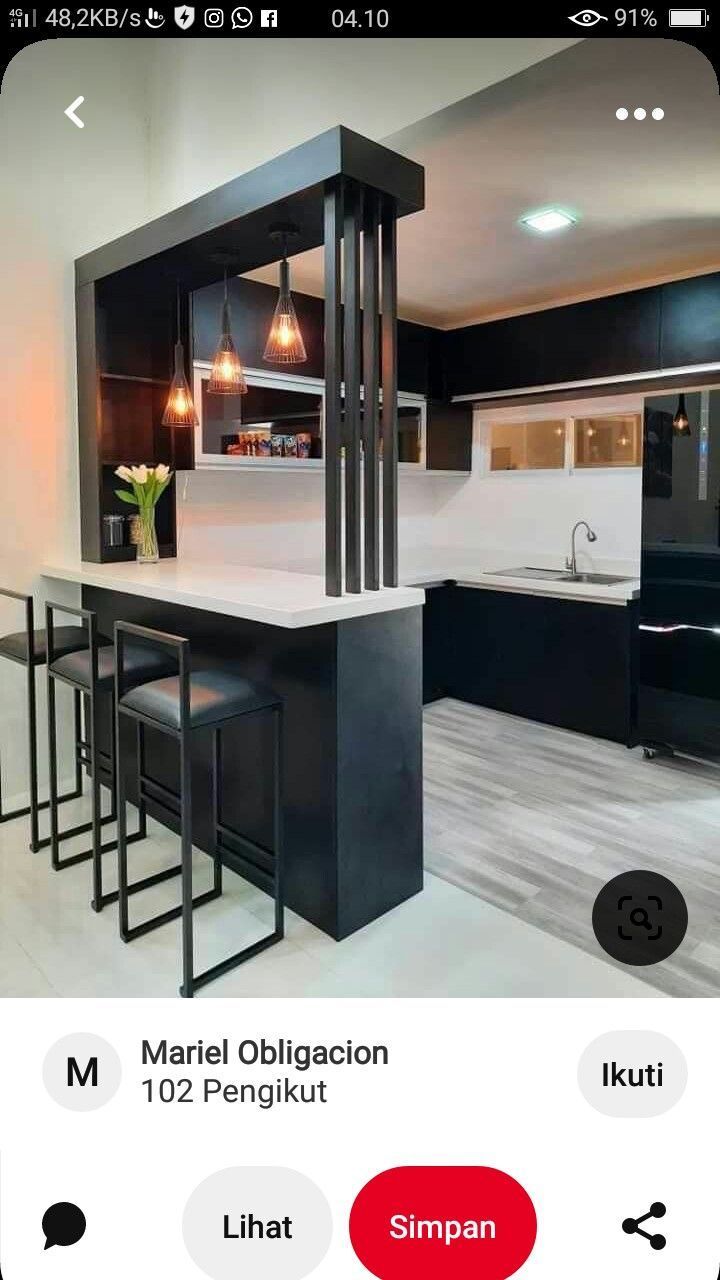 the app shows an image of a kitchen with black and white decor, including bar stools