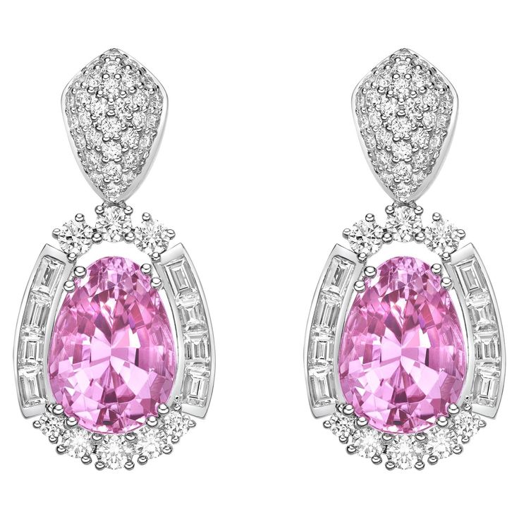 This collection features an array of Pink Tourmaline with a Pink hue that is as cool as it gets! Accented with diamonds these earrings are made in white gold and present a classic yet elegant look.. Pink Tourmaline Drop Earrings in 18 Karat White Gold with Diamond. Pink Tourmaline: 11.19 carat, 9.6X13mm Size, pear Shape. Diamond: 0.85 carat, 2.8X2mm Size, baguette shape, G color, VS Clarity. Diamond: 0.24 carat, 2.8X3.1X2mm Size, Tapper baguette shape, G color, VS Clarity. Diamond: 0.64 carat, 2 Luxury Brilliant Cut Pink Diamond Earrings, Mens Diamond Jewelry, Butterfly Pin, Gold Butterfly, Dream Jewelry, White Metal, Pink Tourmaline, Cute Earrings, Pear Shape