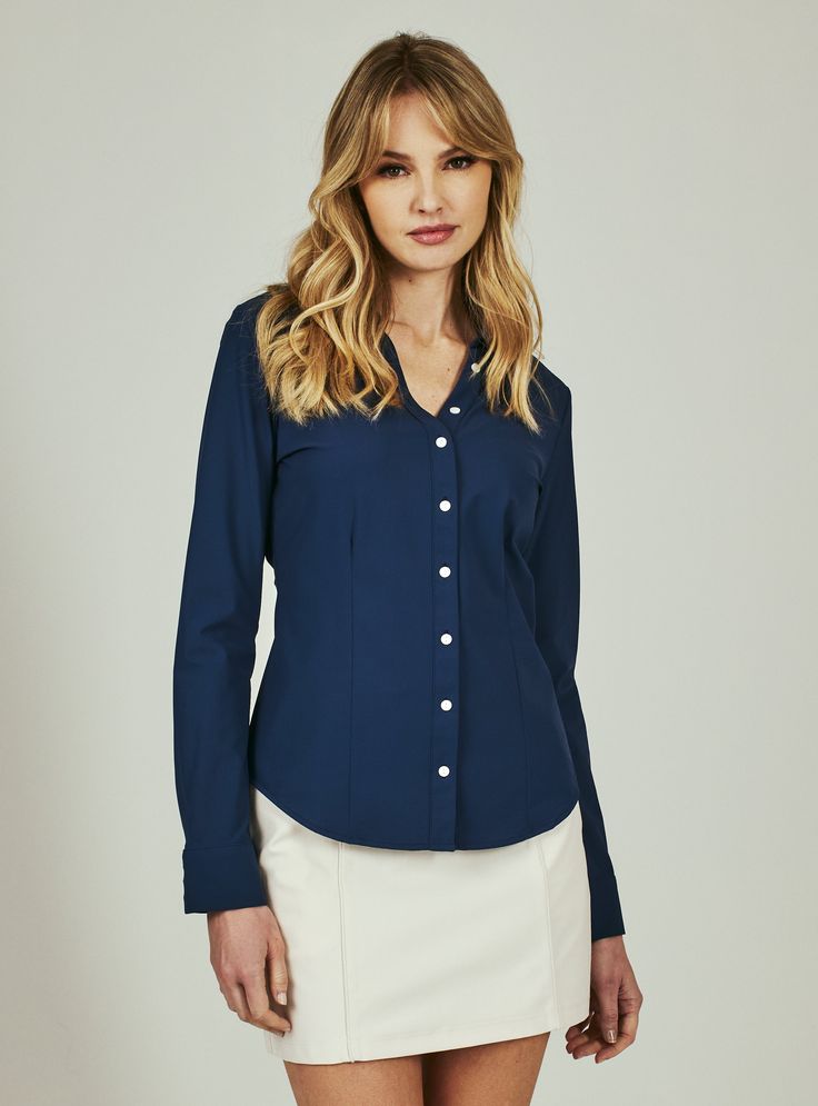 The Luxe Blouse features 4-Way Stretch fabrication that is both moisture-wicking and wrinkle free. This is a flattering semi-fitted blouse designed with mother of pearl buttons for a sophisticated look. Perfect for the office or a fancy dinner on the weekend. Details Model is 5'10" and wears a size small. Care: Machine wash cold on delicate cycle with similar colors. Do not use bleach or alcohol. Cool iron. Hang to dry. Composition: 78% Nylon | 22% Spandex Blouse Designed, Fitted Blouse, Sophisticated Look, Fancy Dinner, Pearl Buttons, Mother Of Pearl Buttons, Wrinkle Free, Lifestyle Brands, The Weekend