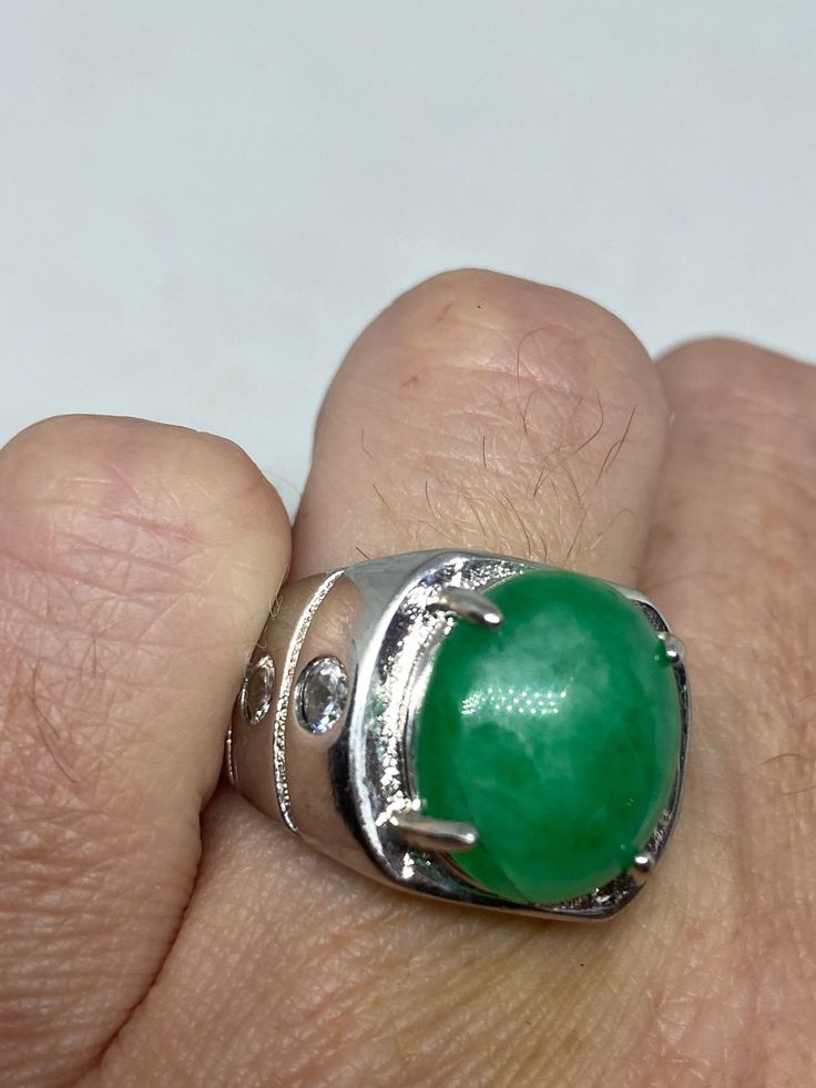 Vintage Lucky Green Nephrite Jade ring Large green nephrite jade Ornate German Silver Vintage ring, does not tarnish, NOT sterling Sizes 7 My jeweler can custom re size for a $10-$20 fee All rings are shipped free in the US in a nice gift box. Check out our over a THOUSAND great reviews Engraving is $4 per letter and is not always perfect depending on the piece. It can take a few days if the jeweler is busy. This is payable to Paypal Judithsltd@gmail.com Oval Green Emerald Signet Ring, Oval Emerald Signet Ring In Green, Green Dome Ring With Polished Finish For Anniversary, Green Emerald Cabochon Rings, Green Crystal Gemstone Ring For Spiritual Wear, Green Cabochon Emerald Ring For Anniversary, Green Oval Signet Ring For Anniversary, Green Spiritual Jewelry With Polished Finish, Jade Gemstone Rings For Healing