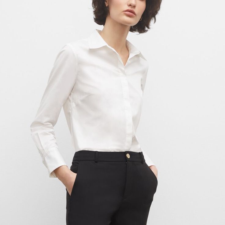 Intricate Pointelle Stitches Elevate A Classic Button-Down Shirt. This Slim-Fit Signature Is Designed To Be Your Wardrobe’s Workhorse, Pairing With Nearly Every Pant You Own, Now And In The Future. Model Is 5’10.5” Wearing A Size S Designed For A Sleek, Softly Tapered Fit That’s Just Right For Tucking. 96% Cotton; 4% Elastane Slim Fit With A 25¾” Length; Based On A Size M Front Button Placket Spread Collar; Long Sleeves With Single-Button Barrel Cuffs; Back Shoulder Yoke; Pointelle-Stitched Trim Timeless Slim Fit Office Tops, Timeless Slim Fit Tops For Office, Timeless Button-up Blouse For Business Casual, Timeless Slim Fit Button-up Tops, Timeless Tops With Button Closure, Timeless Spread Collar Tops For Office Wear, Classic Slim Fit Top With Button Closure, Slim Fit Button-up Blouse With Button Cuffs, Timeless Office Wear Tops With Spread Collar