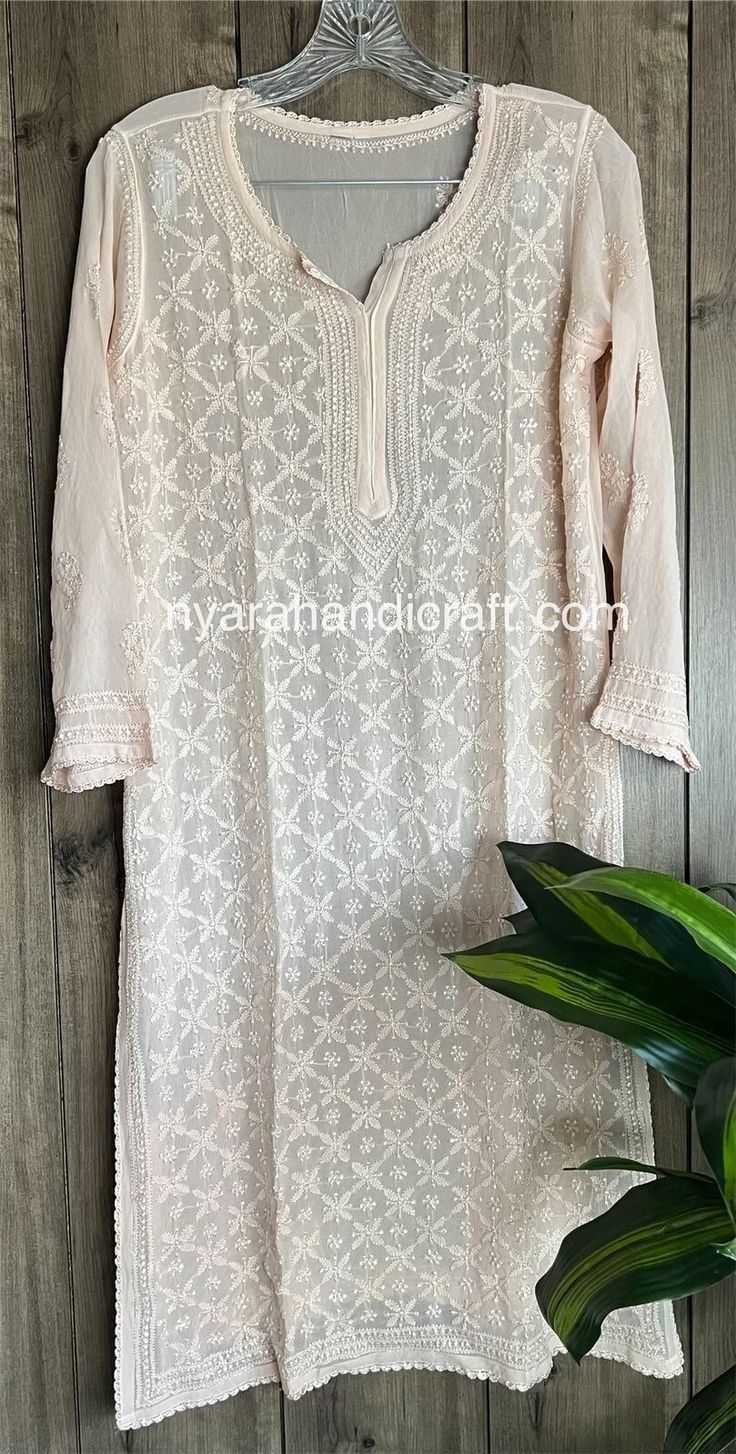 Chikankari hand embroidered kurta on fine georgette.  Delicate resham thread embroidery. Pair it with a white Chikankari palazzo or  pants for a complete look! Kurta Length: 42 inches Sleeves: 3/4 th Chikankari Palazzo, Beige Kurta, Indian Kurti Designs, Plus Size Inspiration, Delicate Embroidery, Unique Blouse Designs, Unique Blouse, Punjabi Wedding, Pink Beige