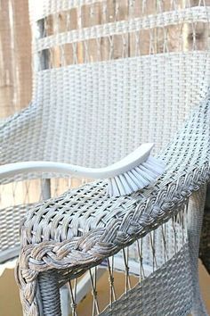 two wicker chairs sitting next to each other