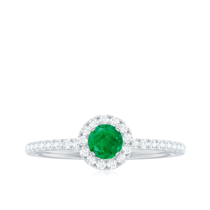 Product Details Style this Solitaire Ring with precious simplicity. This Engagement Ring is adorned with Round Shape Emerald Gemstone set in a Prong Setting with diamond Halo and beautifully crafted in hallmarked metal Product Information SKU SHP-RINGS112029645 Width 4 mm Height 6.5 mm Weight 1.20 gm (Approximate) EMERALD INFORMATION No.of Stones 1 Pieces Total Weight 0.50 Carat (Approximate) Dimension(approx) Round-5X5 mm-1 Pcs Color Green Cut Brilliant Shape Round Setting Type Prong-Setting Qu Emerald Solitaire Ring, Ring With Diamond, 18k Yellow Gold Ring, Emerald Gemstone, Diamond Halo, Emerald Ring, Yellow Gold Rings, Solitaire Ring, Halo Diamond