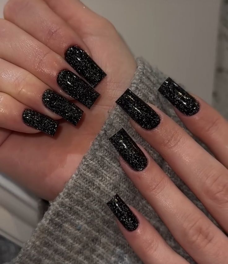 Black Nail With Sparkle, Black Sparkly Nails Coffin, Short Acrylic Nails Black And Silver, Black Nails With Glitter Design, Black Glitter Nails Square, Glitter Black Nails Acrylic, Black Sequin Nails, Dark Grey Nails With Glitter, Dark Glitter Nail Designs