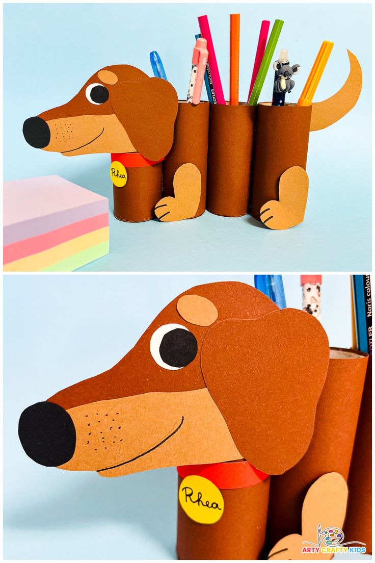 a cardboard dog with pencils in it's mouth and another photo of the same dog