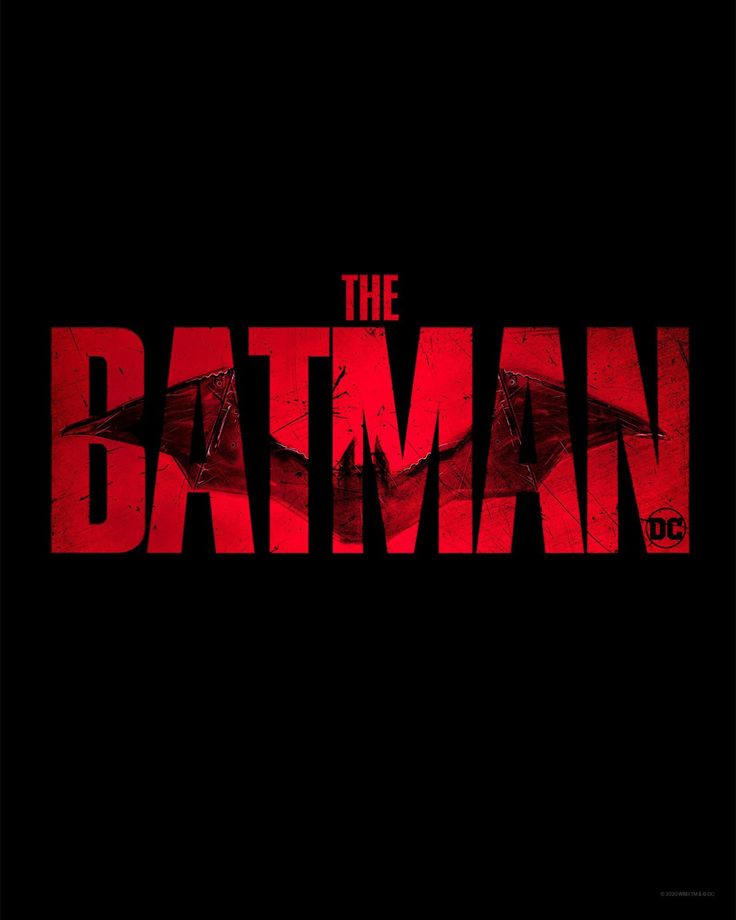 the batman logo is shown in red and black, while it appears to be dark