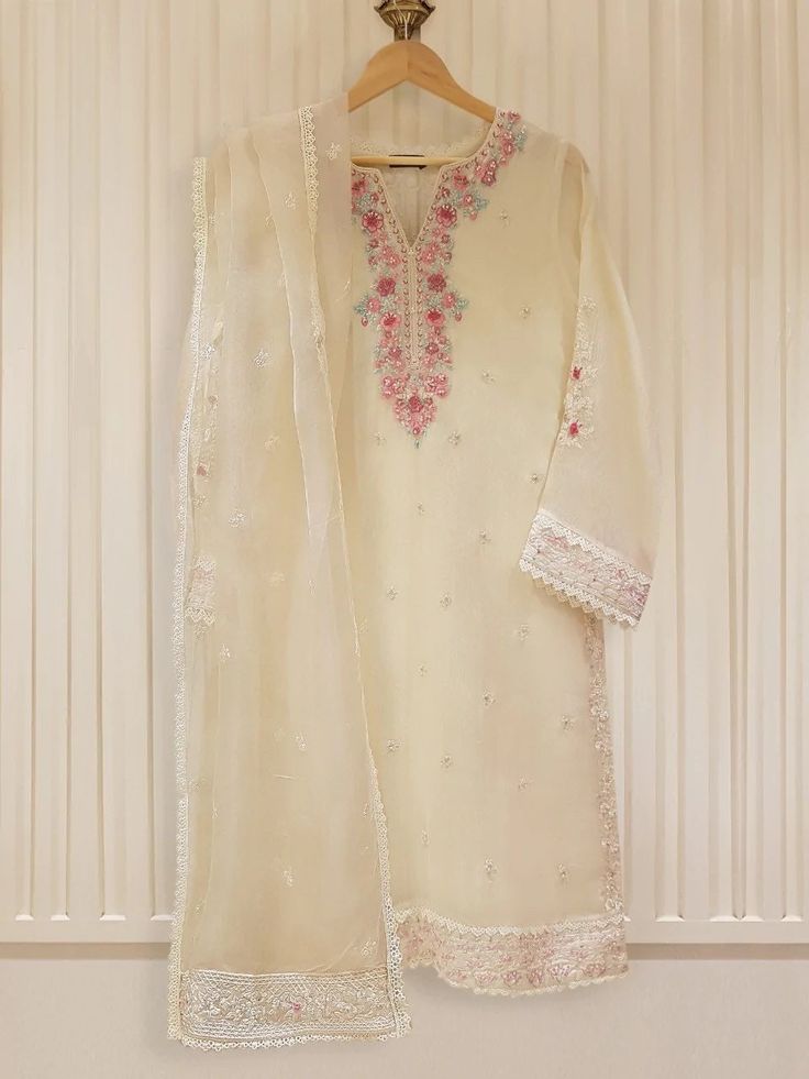 "Two piece pure cotton net embroidered and handwork shirt with dupatta length: \"41\" dupatta fabric: organza" Unstitched Chanderi Kurta With Dabka Work, Organza Sharara With Naqshi For Diwali, Designer Shantoon Kurta With Dupatta, Festive Cream Unstitched Suit With Dabka, Unstitched Naqshi Suit In Chinon, Festive Chinon Dupatta With Naqshi, Festive Naqshi Dupatta In Chinon, Eid Naqshi Unstitched Chinon Suit, Wedding Cambric Sets With Dupatta