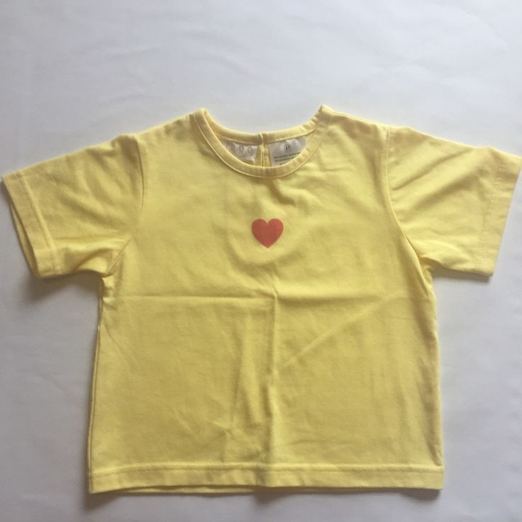 Nwot Yellow Cotton-Blend Toddler Girls Tee Shirt With Pink Heart With Short Sleeves And Back Button Closure. 60% Cotton / 40% Polyester Machine Wash Cold Tumble Dry Low Spring Crew Neck Tops For Playtime, Crew Neck Tops For Playtime In Spring, Crew Neck Tops For Spring Playtime, Cute Yellow T-shirt For Playtime, Spring Playtime Short Sleeve T-shirt, Basic T-shirt For Summer Playtime, Yellow Tops For Spring Playwear, Yellow Spring Tops For Playwear, Cute Yellow Cotton T-shirt