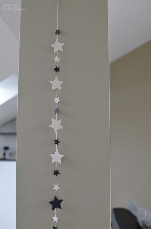 the stars are hanging on the wall in the room