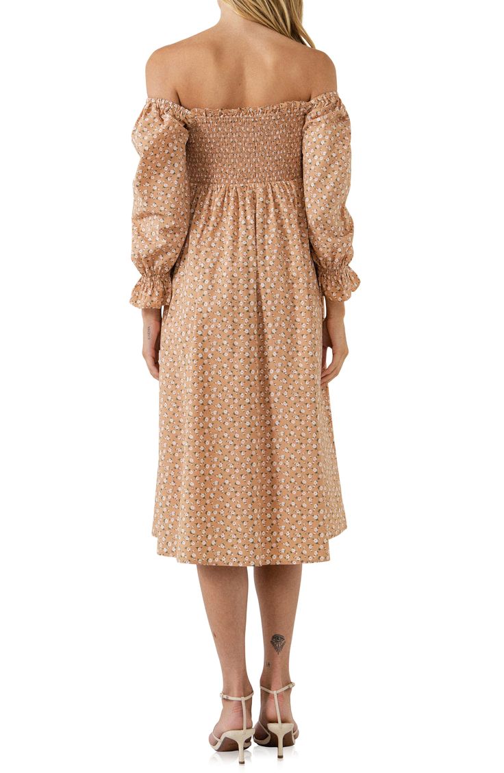 A ditsy floral print covers a muted long-sleeve midi dress with a smocked bodice, blouson sleeves and a twirly skirt. Lined 70% cotton, 27% nylon, 3% spandex Hand wash, dry flat Imported Spring Modest Smocked Dress, Spring Modest Smocked Dress With Smocked Back, Feminine Smocked Top For Fall, Feminine Fall Smocked Top With Floral Print, Feminine Floral Smocked Top For Fall, Spring Floral Print Prairie Dress, Midi Length, Spring Floral Print Midi Prairie Dress, Spring Floral Print Prairie Dress Midi Length, Casual Smocked Dress With Ditsy Floral Print For Brunch