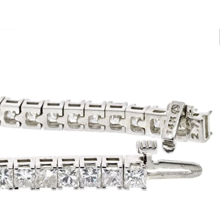 Indulge in the timeless elegance of our 14K White Gold 7 Carat Princess Cut One Line Tennis Bracelet. This exquisite piece is meticulously crafted in 14K white gold and adorned with a dazzling array of 7.70 carats of princess cut diamonds. Every diamond is carefully selected for its exceptional brilliance and fire, creating a captivating sparkle that will mesmerize onlookers.Designed to be worn effortlessly from day to night, this tennis bracelet is 7 inches long, draping gracefully around your Luxury Platinum Diamond Bracelet With Diamond Accents, Luxury Platinum Diamond Bracelet With Accents, Luxury Platinum Diamond Bracelet With Single Cut Diamonds, White Platinum Diamond Bracelet With Accents, Luxury Diamond White Diamond Bracelet For Anniversary, Exquisite Platinum Diamond Bracelet With Brilliant Cut, Luxury Diamond White Bracelet For Anniversary, Luxury Diamond Cut Bracelet, Exquisite Platinum Tennis Bracelet With Diamond Accents