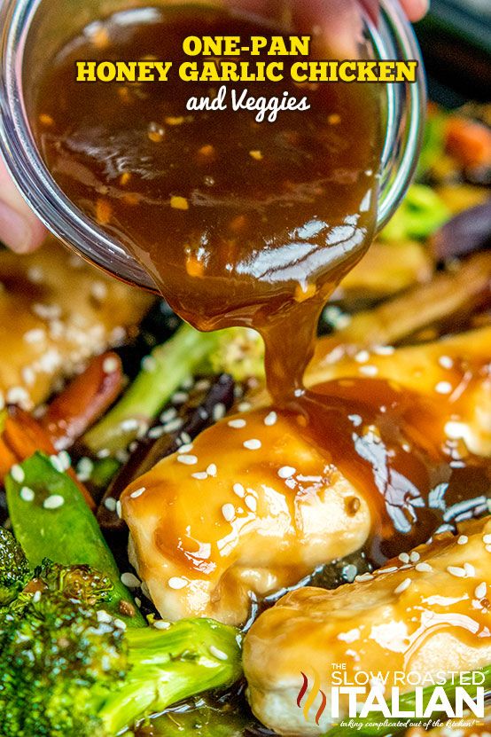 honey garlic chicken and veggies with teriyan sauce being drizzled over them