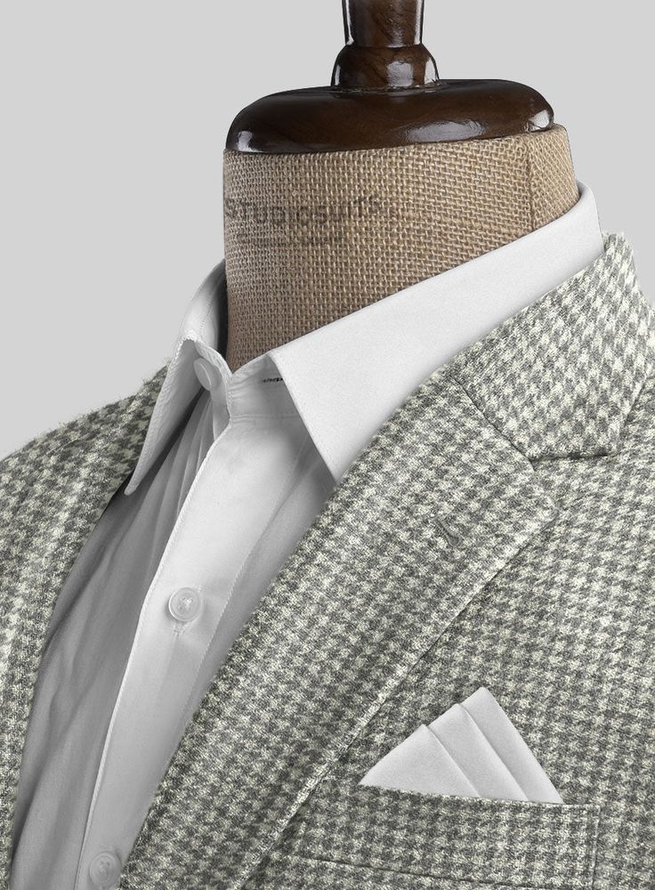 The semblance of a person sometimes is identified by the fashion one chooses to be different from everyone else. Tailored with wool, our Houndstooth Light Gray Tweed Suit is a piece with a houndstooth pattern which is a unique design that looks like a hound dog's tooth and gives warmth at every wear. In addition, the light gray color will emanate your personality giving positive vibes. So include this excellently designed suit in your closet, which will create a trend that will never go out of style.  Look Includes   Houndstooth Light Gray Tweed Fabric  Two Button Jacket Style  Notch Lapel  Real Horn Royal Buttons  Single Vent  Three Cuff Buttons  Two Welted Back Pockets on Trousers    Click 'Customize Now' to modify the look if needed.   Lining: Viscose; Dry Clean. Tweed Blazer With Houndstooth Pattern, Tailored Tweed Blazer With Houndstooth Pattern, Tweed Jacket With Houndstooth Pattern For Business Casual, Wool Houndstooth Suit With Suit Collar, Tweed Houndstooth Blazer With Notch Lapel, Formal Wool Houndstooth Tweed Jacket, Tailored Wool Suit With Houndstooth Pattern, Classic Wool Tweed Jacket With Houndstooth Pattern, Classic Wool Houndstooth Tweed Jacket