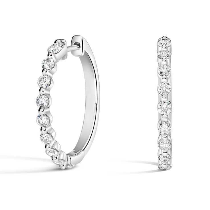 Luxe Marseille Diamond Hoop Ears - 18K White Gold. Stunning yet effortless, these beautiful hoop earrings feature glistening round diamonds in sophisticated shared prong settings (5/8 total carat weight). Diamond Halo Hoop Earrings, Classic Diamond White Hoop Huggie Earrings, Classic Diamond Hoop Earrings With Single Cut Diamonds, Formal Diamond White Hoop Earrings With Halo Design, Classic Diamond Huggie Earrings With Brilliant Cut, Hoop Diamond Earrings With Halo Design, Luxury Diamond Hoop Earrings With Prong Setting, Classic Diamond White Hoop Earrings, Timeless Diamond White Diamond Hoop Earrings