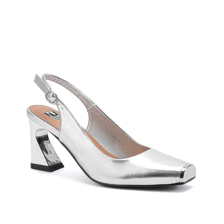 Ninety Union-Loraine Pump Be in the spotlight wearing the Loraine pump from Ninety Union. Metallic upper with a chic square toe and a slant heel uplift the eye-catching appeal of this slingback pump. With a lightly cushioned footbed, you'll feel comfortable all through the day. Chic Silver Slingback Pumps For Evening, Modern Silver Slingback Pumps For Formal Events, Sleek Silver Slingback Pumps For Formal Occasions, Silver Slingback Pumps With Padded Heel For Evening, Party Slingback Pumps With Wrapped Heel And Square Toe, Party Slingback Pumps With Stacked High Heel, Chic Silver Slingback Pumps With Open Heel, Modern Silver Slingback Pumps With Sculpted Heel, Chic Square Toe Heels For Gala