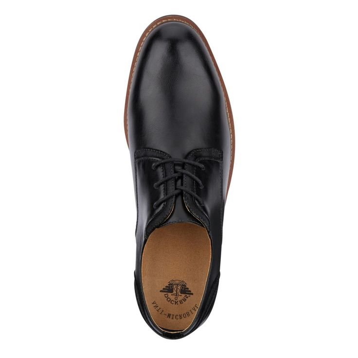 Refine your look and elevate your style with these carefully crafted men’s dress shoes. The synthetic uppers combined with a perfect balance of mixed materials accents and detailed stitching create a look that is sleek and subtle. The durable outsole adds traction, while inside you’ll find Dockers lightweight technology footbed, which means your feet will not only be smelling fresh but will be comfortable and relaxed in any setting. Classic Formal Lace-up Shoes With Ortholite Insole, Classic Black Synthetic Lace-up Shoes, Black Plain Toe Dress Shoes For Work, Business Wingtip Dress Shoes With Ortholite Insole, Synthetic Brogue Dress Shoes For Work, Modern Synthetic Dress Shoes For Business, Plain Toe Synthetic Dress Shoes For Work, Masculine Black Dress Shoes For Business Casual, Synthetic Plain Toe Dress Shoes For Work