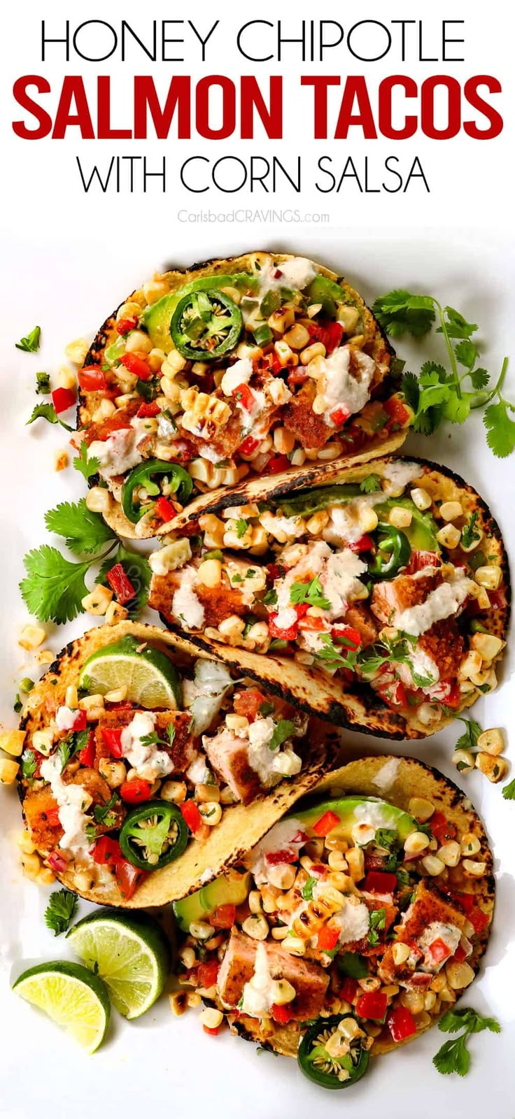 grilled fish tacos with corn salsa on a white plate and text overlay reads honey chipotle salmon tacos with corn salsa