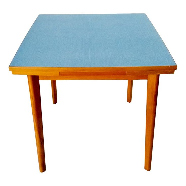 a wooden table with a blue top on a white background