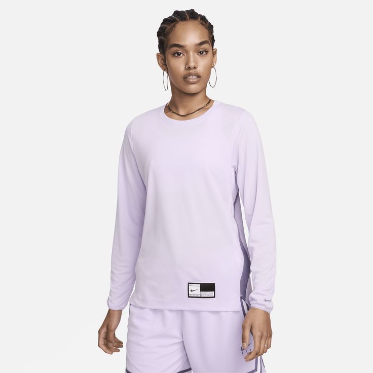 Bring your focus to the basketball court in this sweat-wicking warm-up top. Its lightweight fabric combines with an easy fit so you can pass and pivot feeling free. Nike Athleisure Tops For Sports Events, Purple Athleisure Tops For Sports, Nike Sweat Resistant Tops For Sports Season, Nike Functional Streetwear Tops, Nike Go-dry Top For Streetwear, Purple Moisture-wicking Activewear For Sports Events, Purple Casual Tops For Sports Events, Nike Athletic Fit Sweat Resistant Top, Purple Moisture-wicking Top For Sports Events