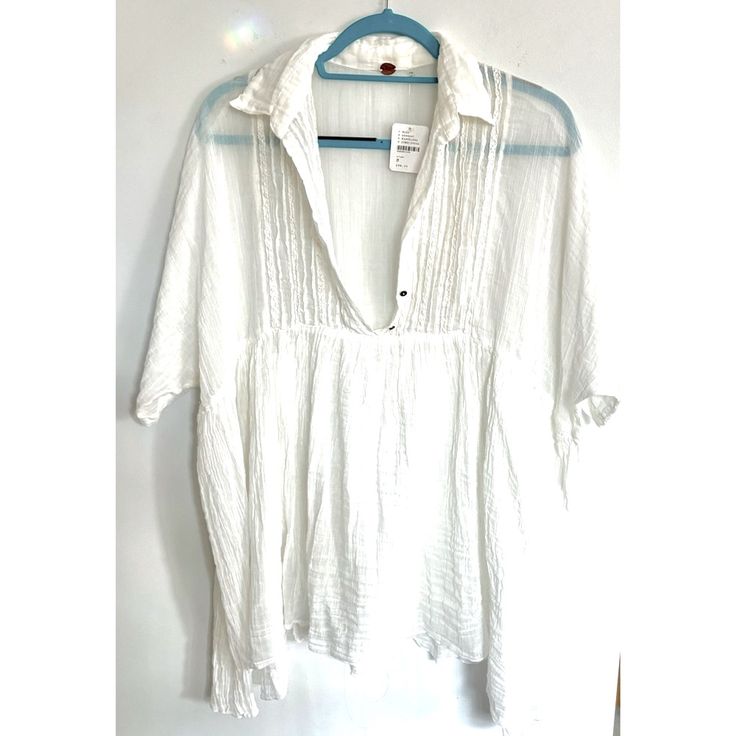 Brand: Free People Color: White Theme: Summer Boho Casual Baggy Boho Foho, Hobo Chic, Bohugly, Girl Authority Indie Occasion: Daytime Casual Beach Season: Summer Spring Fall Style: Boho Peasant Oversized Baggy Department: Women's Condition: New With Tags Size: Small Material: 100% Cotton Features: Breathable, Comfortable & Soft Short Sleeves -Ruffle Flowy Chest -Low Cut, 2 Small Button Closure Option -Relaxed Loose Fitting -Casual Flowy Hem To Cover All Body Shapes And Pairs With Pants, Jeans, L Summer Cotton Blouse For Daywear, Casual Summer Tunic Peasant Top, White Relaxed Fit Peasant Top For Beach, Casual Tunic Peasant Top For Summer, White Casual Tunic Peasant Top, Summer V-neck Peasant Top With Relaxed Fit, Casual Short Sleeve Peasant Top For Beach, Cotton Short Sleeve Blouse For Vacation, Summer Tunic Top With Relaxed Fit