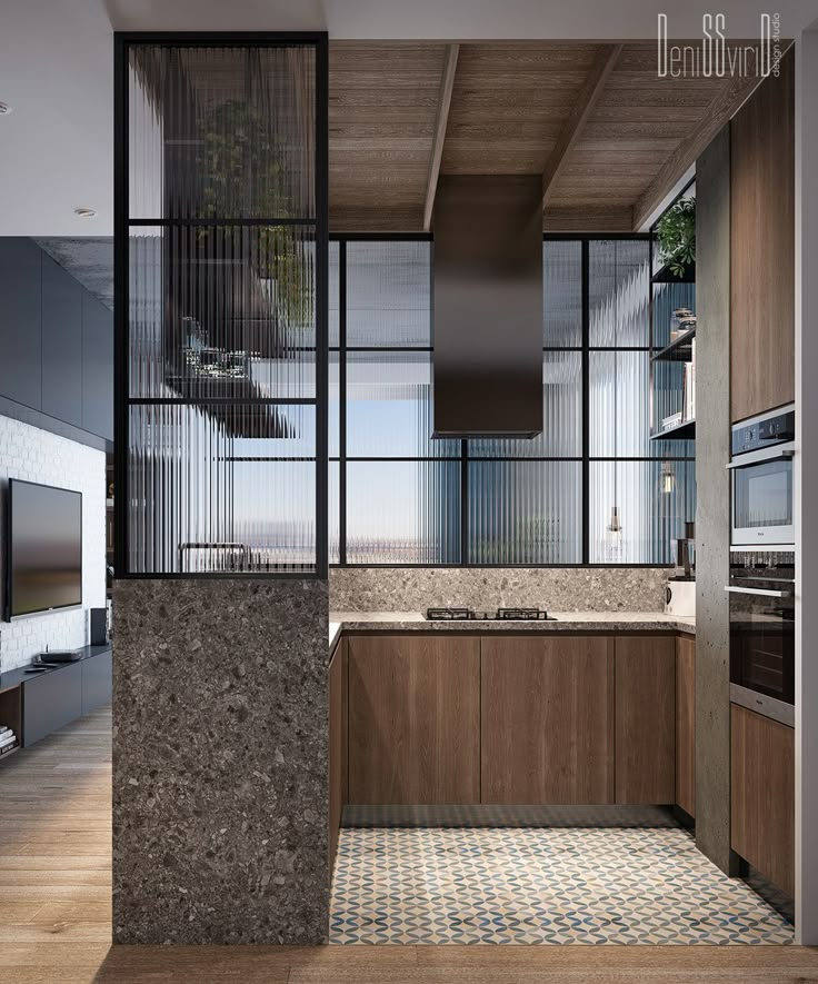 the interior of a modern kitchen with marble counter tops